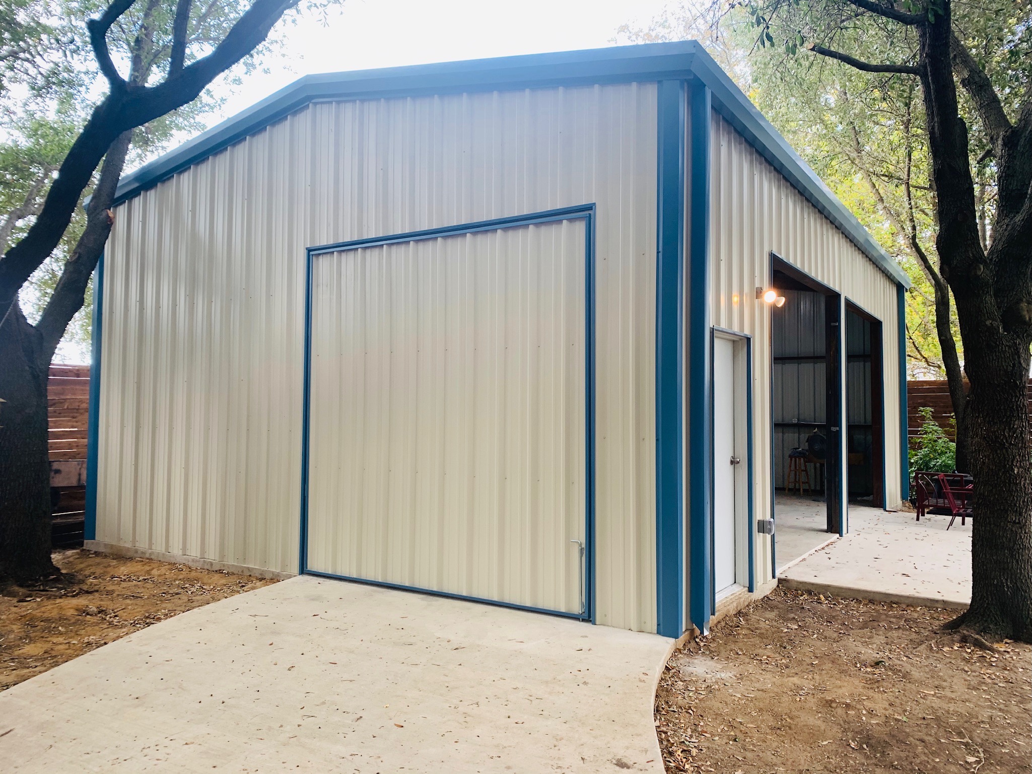 Metal Garage Tan Exterior with Blue Trip